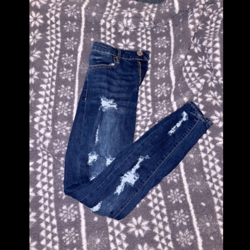 Blue ripped jeans